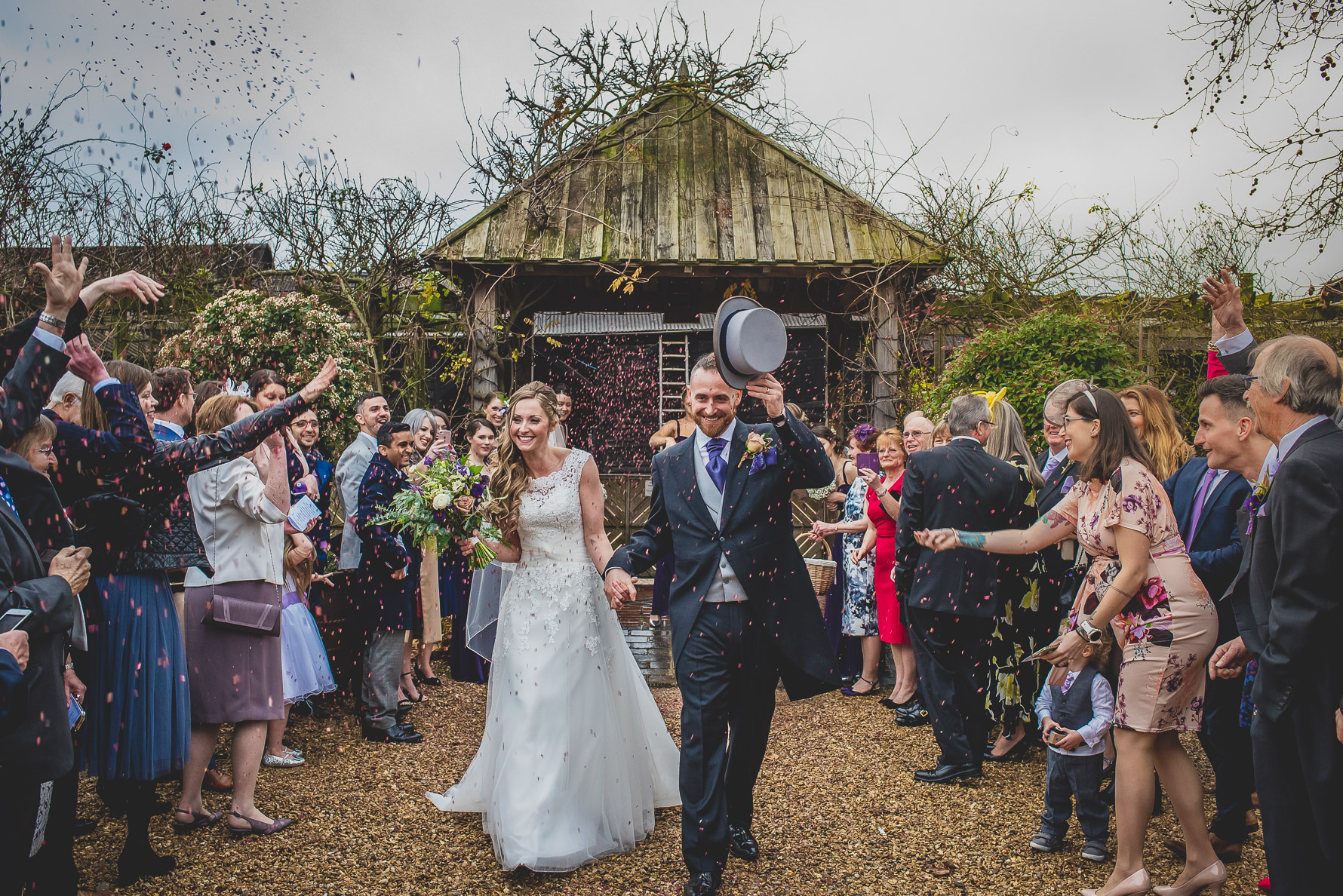 Bride & Groom confetti shot at South Farm Cambridgeshire Wedding Venue